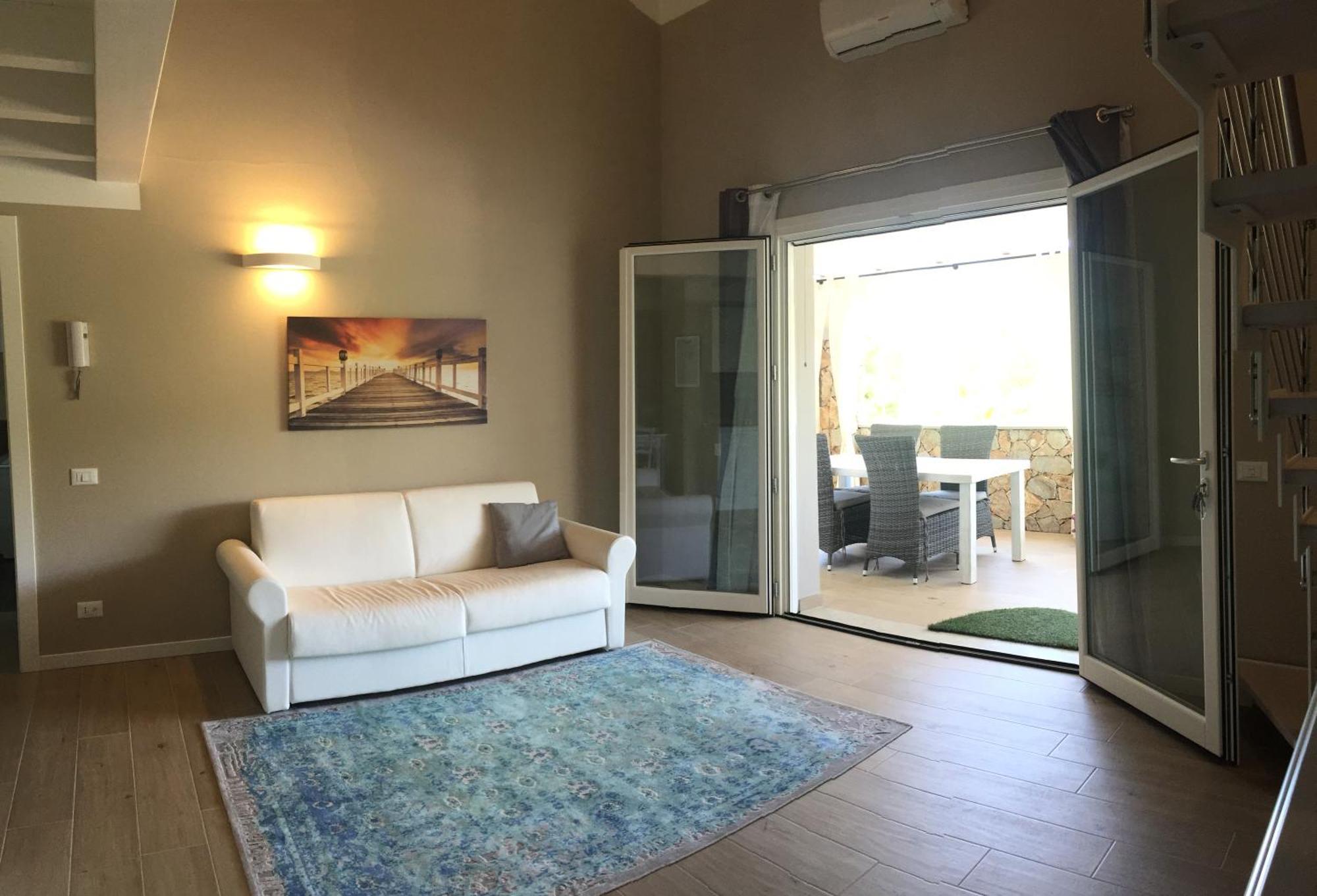 Residence Elegance Ville Ed Appartamenti A Porto Pino Bagian luar foto