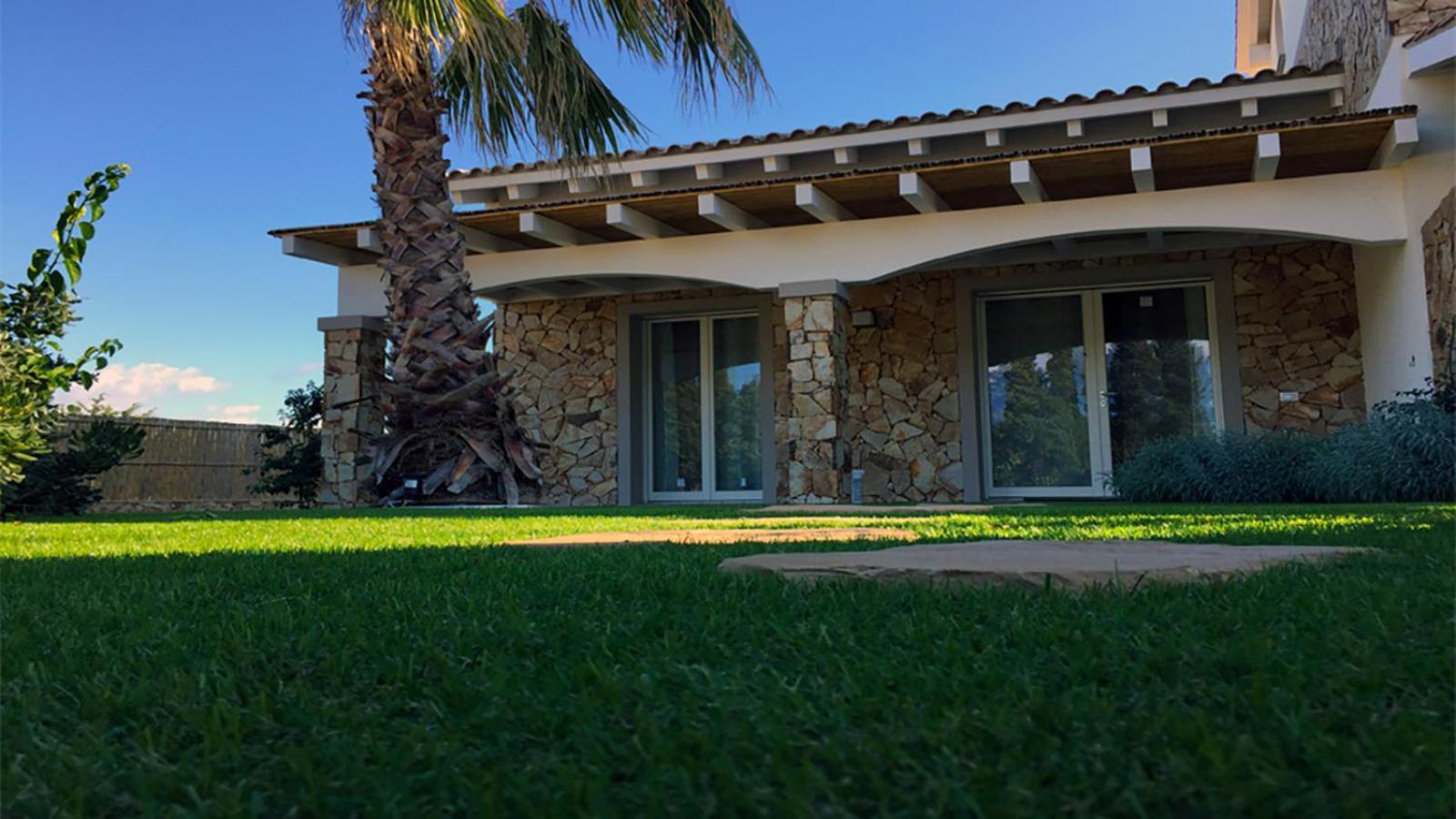 Residence Elegance Ville Ed Appartamenti A Porto Pino Bagian luar foto