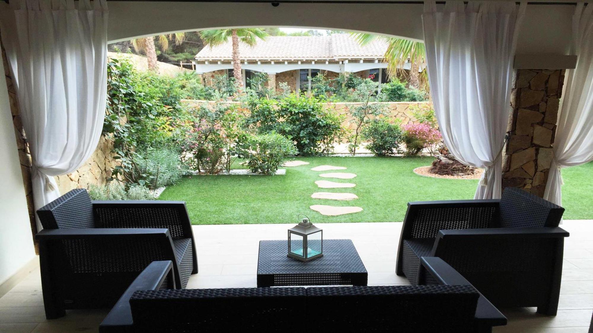 Residence Elegance Ville Ed Appartamenti A Porto Pino Bagian luar foto