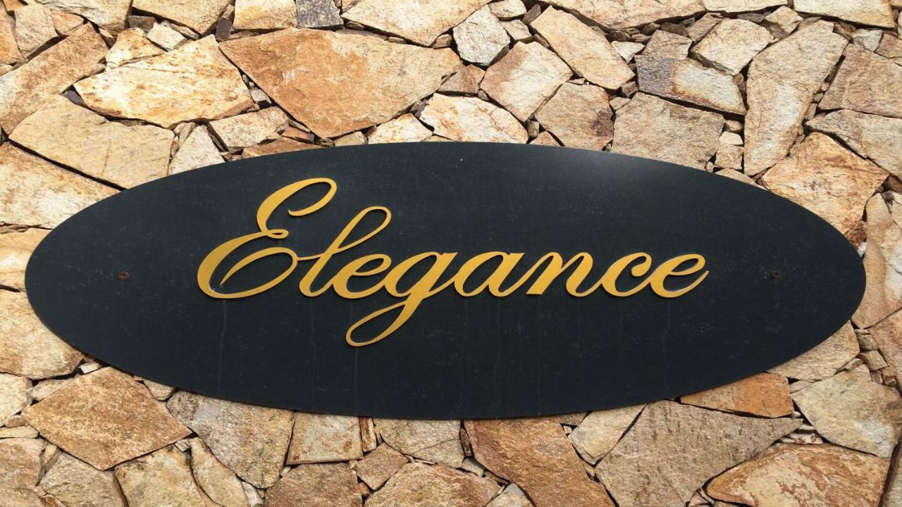 Residence Elegance Ville Ed Appartamenti A Porto Pino Bagian luar foto